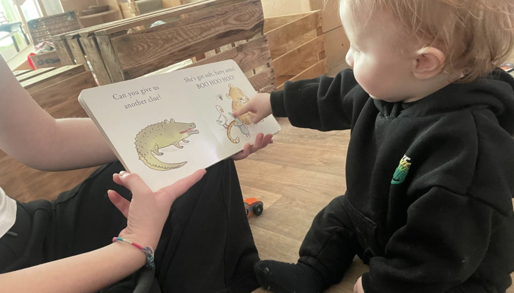 Kids playing in caterpillar room